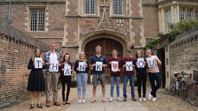 Telephone campaign students holding a Thank You sign